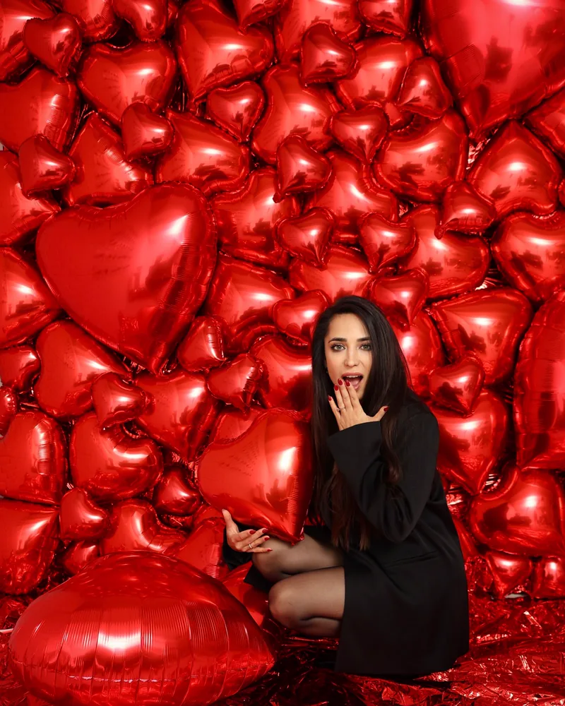 A wall of red foil heart balloons built for Valentine's Day